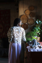 Load image into Gallery viewer, Back view of lady by the sink, wearing a top with puffy sleeves