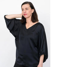 Load image into Gallery viewer, Lady wears a V-neck Cuff Top