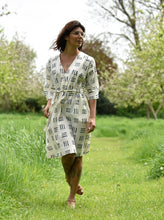 Load image into Gallery viewer, Model wears Jumpset Dress, knee-length, with tie belt at waist