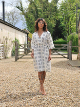 Load image into Gallery viewer, Model wears knee-length Jumpset Dress without waist belt