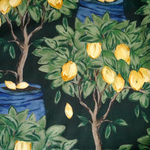 Load image into Gallery viewer, Cotton Lawn fabric with a pattern of lemon trees with lemons, shown close-up, flat