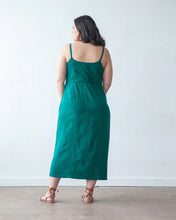 Load image into Gallery viewer, Back view of model wearing spaghetti strapped, low scoop neckline, long dress