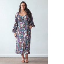 Load image into Gallery viewer, Model wears an above the ankle, button-front dress, with long puff sleeves