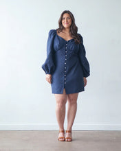 Load image into Gallery viewer, Model wears button-front, above knee-length dress, with long puff sleeves