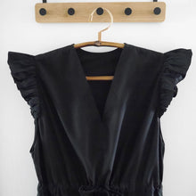 Load image into Gallery viewer, V-neck dress bodice detail with flutter shoulder detail and waist tie, displayed on hanger