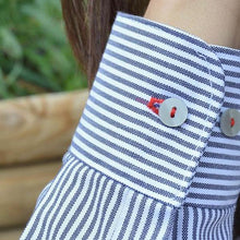 Load image into Gallery viewer, Close up of striped cuff detail, buttonhole sewn in contrasting colour