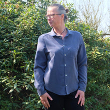 Load image into Gallery viewer, Lady wears the Anna Shirt fastened up with one chest pocket, long sleeves