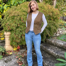 Load image into Gallery viewer, Lady wears Pika Vest opened over a long sleeved jersey shirt