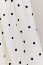 Load image into Gallery viewer, Close up of EcoVero Viscose fabric with dots print