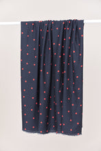 Load image into Gallery viewer, Dot print EcoVero Viscose Crepe fabric hangs over a rail
