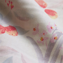 Load image into Gallery viewer, Close up detail of organic cotton double gauze fabric weave with fruit print