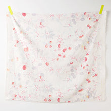 Load image into Gallery viewer, Square piece of organic cotton double gauze fabric hangs on white with tape on both top corners, features a watercolour print of fruits and florals