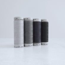 Load image into Gallery viewer, Four reels of Recycled Polyester Sewing Thread in four colours