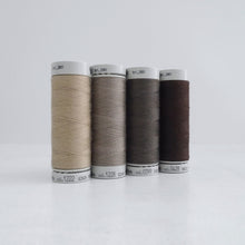 Load image into Gallery viewer, Four reels of Recycled Polyester Sewing Thread in four colours