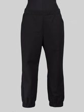 Load image into Gallery viewer, Front image of Almost Long Trousers worn on a mannequin.