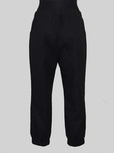 Load image into Gallery viewer, Back image of Almost Long Trousers worn on a mannequin.