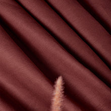 Load image into Gallery viewer, Close up of linen viscose fabric in soft pleated folds