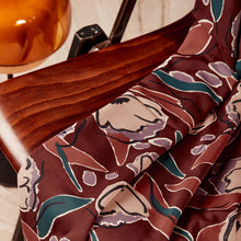 Load image into Gallery viewer, EcoVero Viscose fabric in soft pleated folds on a wooden chair