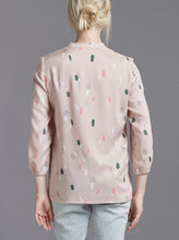 Load image into Gallery viewer, Back view of The Blouse with 3/4 length sleeves, worn by lady, hands by side.