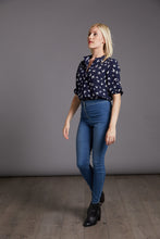 Load image into Gallery viewer, Front side view of lady walking wearing The Blouse of bird print fabric, tucked into jeans.