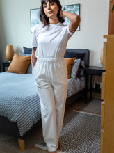 Load image into Gallery viewer, Front view of lady standing wearing The Pyjama Bottoms.