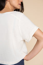 Load image into Gallery viewer, Close up detail of Cielo Top drop shoulder seam and loose short sleeve