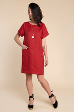 Load image into Gallery viewer, Lady wears a shift dress with hand in front inseam pocket