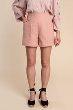 Load image into Gallery viewer, Lady wears Pietra shorts with hand in pocket