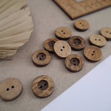 Load image into Gallery viewer, 20mm, 2-hole coconut buttons scattered across worktop