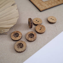 Load image into Gallery viewer, 20mm, 2-hole coconut buttons scattered across worktop