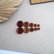 Load image into Gallery viewer, Five different sizes of Corozo buttons lined up