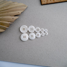 Load image into Gallery viewer, 5 different sizes of Corozo buttons lined up