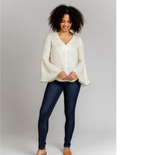 Load image into Gallery viewer, Lady wears Megan Nielsen Dove Blouse, a V-neck tunic blouse with flared sleeves