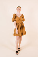Load image into Gallery viewer, Front view of knee-length Estella dress with a cross-over front option