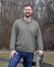 Load image into Gallery viewer, Front view of man wearing green Finlayson sweater with shawl collar.
