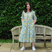 Load image into Gallery viewer, Lady wears Freedom Dress in pattern print fabric