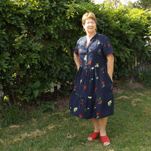 Load image into Gallery viewer, Lady wears Freedom Dress with hand in pocket