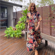 Load image into Gallery viewer, Lady wears Freedom Dress with tie collar and loose sleeves