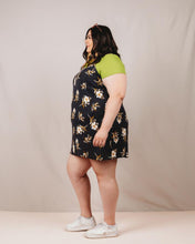 Load image into Gallery viewer, Side view of lady wearing an above-knee length Saltwater Slip Dress over a tee