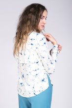 Load image into Gallery viewer, Back view of lady wearing a blouse with cape detail.