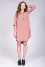 Load image into Gallery viewer, Front view of lady wearing tunic style dress in pink fabric.