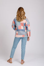 Load image into Gallery viewer, Back view of lady wearing Hovea jacket, quilted, hip length