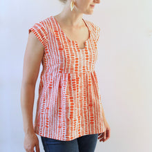 Load image into Gallery viewer, Lady wears tunic blouse of Trillium dress with cut out collar