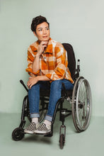 Load image into Gallery viewer, Lady sits in wheelchair wearing checked fabric Ilford Jacket with fold up sleeves