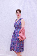 Load image into Gallery viewer, Lady wears a sleeveless dress of GIverny Viscose Fabric print
