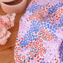 Load image into Gallery viewer, Floral viscose fabric slightly crumpled displayed next to dried flowers and vase