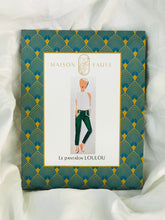 Load image into Gallery viewer, Loulou sewing pattern packaging showing illustration of lady wearing a pair of fitted trousers.