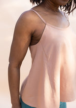 Load image into Gallery viewer, Lady wears Paola Top, detail of side panel with flare