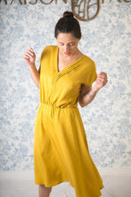 Load image into Gallery viewer, Lady wears Byzance Dress, v-neck, cap sleeves, knee length