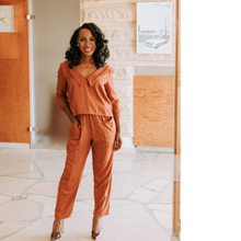 Load image into Gallery viewer, Lady stands wearing a Faye jumpsuit with flat collar and trousers with front drop pockets